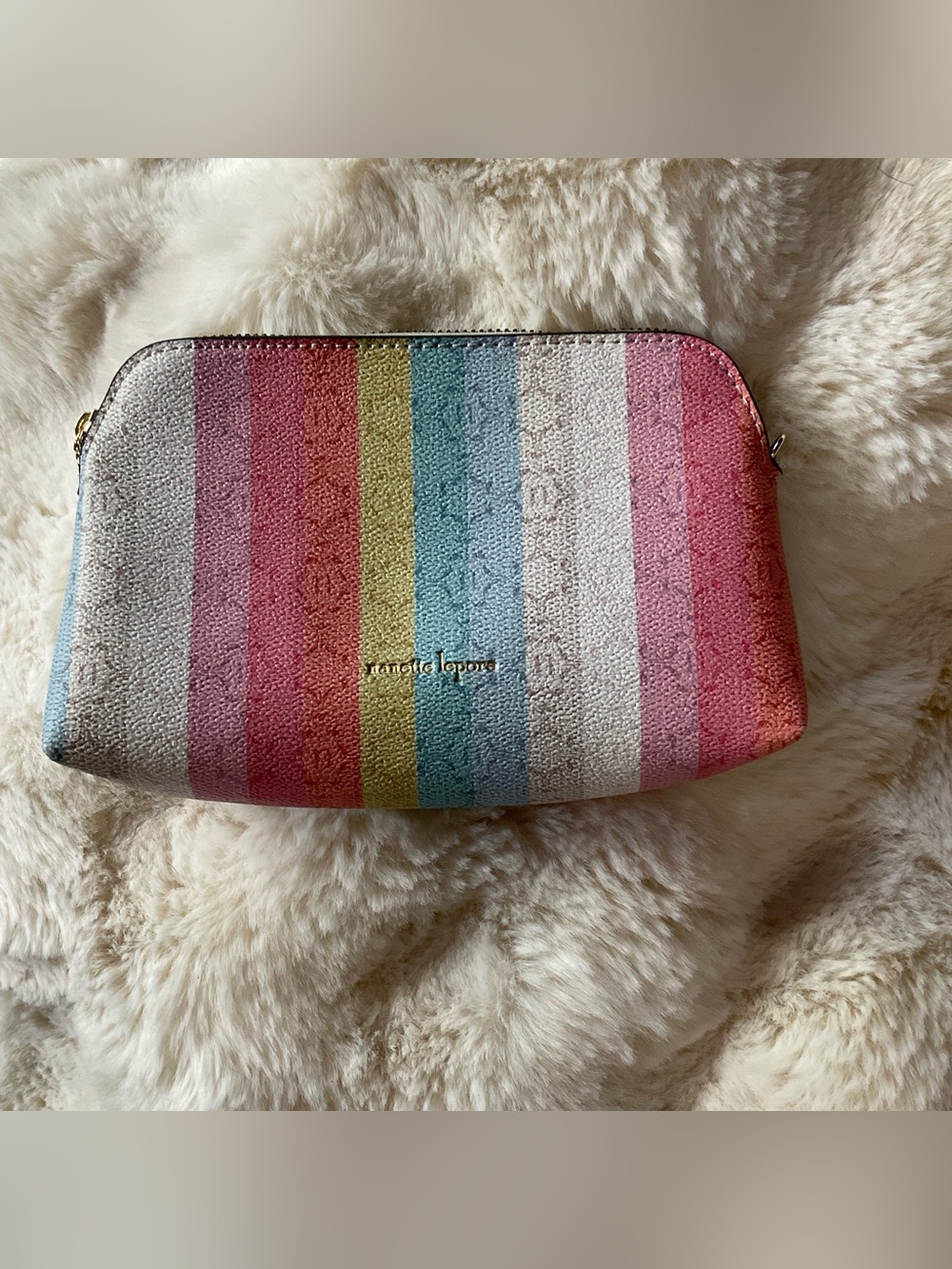 Nanette Lepore cosmetic bag w/ rainbow stripped pattern, zip closure, EUC
